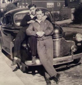 My Papa as a young man. (sitting on car)